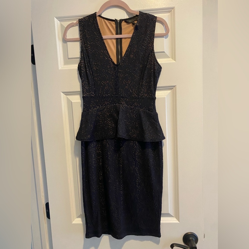 Xs black sleeveless dress with peplum waist. BCBG maxazria